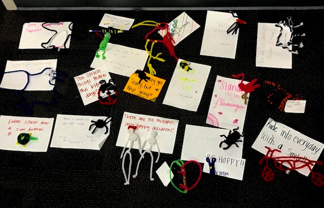 pipe cleaner animals with notes attached